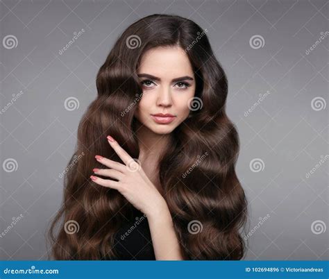 Beauty Hair Brunette Girl With Long Shiny Wavy Hair Stock Photo