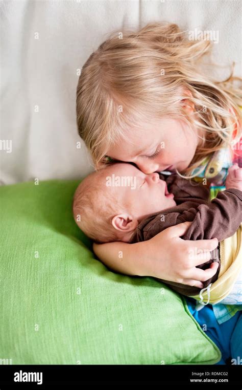 Sister Taking Care Little Brother Hi Res Stock Photography And Images