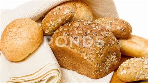 Assortment of baked bread on wooden board Stock Footage,#bread#baked#Assortment#wooden | Bread ...
