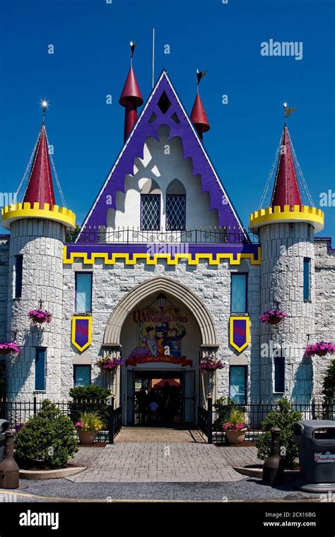 Amusement Park Entrance Castle Theme People Entering Flowers Colorful Fun Attraction
