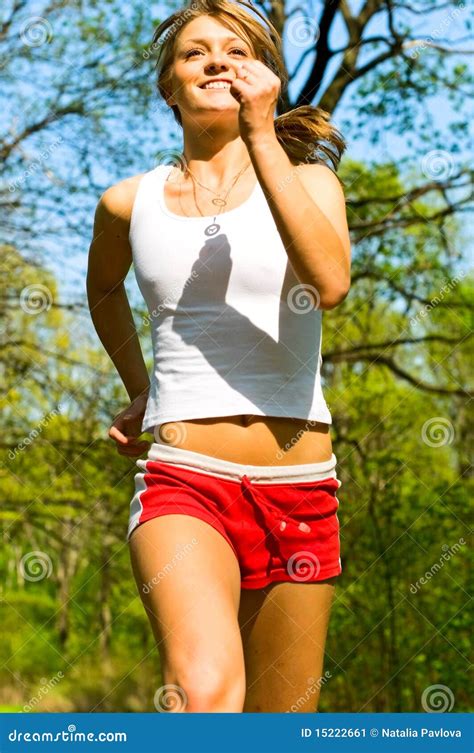 pretty smiling woman jogging stock image image 15222661