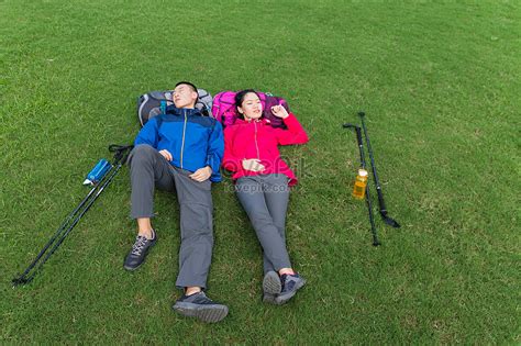 Outdoor Hiking Couples Sleeping On Grassland Picture And Hd Photos