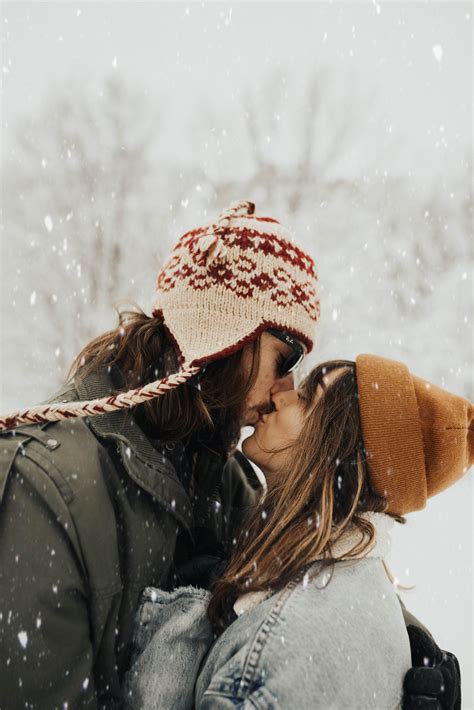 snowy couple session in blizzard. Couple session in snow. Casual and sporty outfits for couple ...
