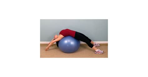 How To Stretch Your Back Using An Exercise Ball Popsugar Fitness