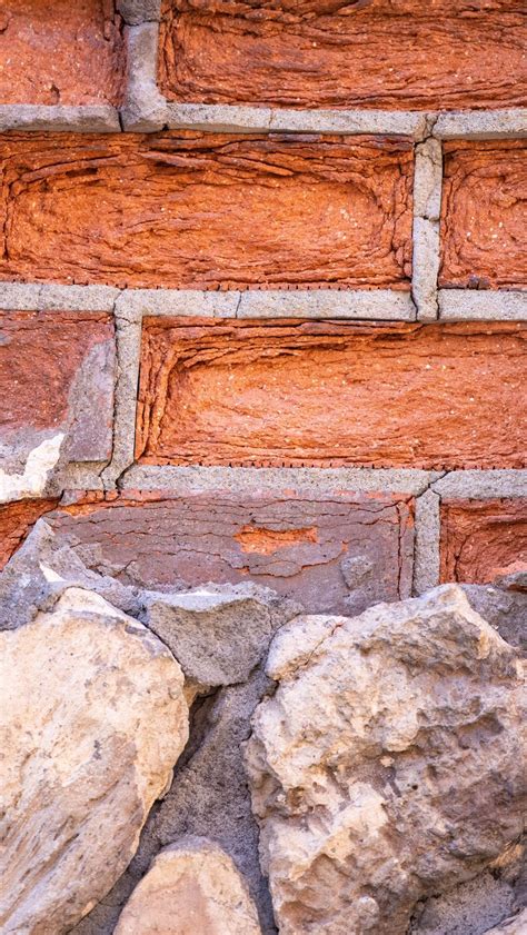 Download Wallpaper 800x1420 Wall Bricks Stones Relief Texture