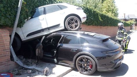 Costly Crash Porsche Taycan Hits Macan Smashes Against Wall Ht Auto