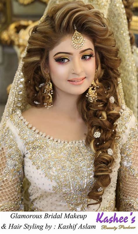 a woman in a bridal makeup and hair styling by kashif aslam