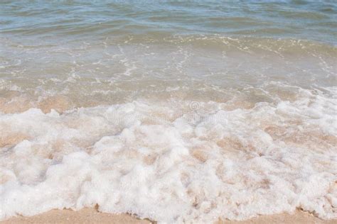 Sea Waves On A Sandy Shore In The Afternoon Stock Photo Image Of