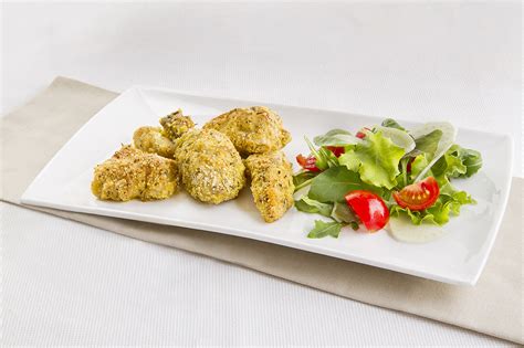 Spennellate le polpette cotte con la salsa barbecue, quindi rimettetele in forno per 2 minuti. Pollo panato al forno | Cannamela