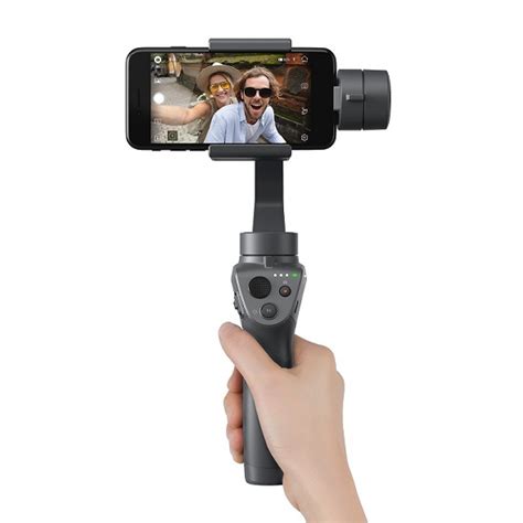 Charging the osmo mobile 2 to charge the osmo mobile 2, connect a usb adapter (not included) to the charging port using the provided power cable. DJI、スマホ向けスタビライザー「Osmo Mobile 2」発売 1万6800円、バッテリーで15時間駆動 ...