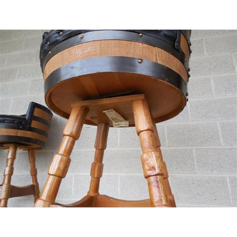 It is a bar stool that features a durable construction and a comfortable round seat covered with leather. Set of 3 Vintage Whiskey Barrel Back Retro Tufted Oak Base ...