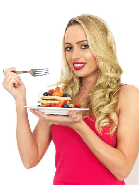 Young Woman Eating Pancakes Witrh Fruit And Syrup Stock Image Image