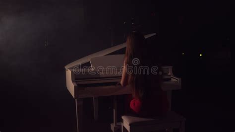 4k Footage Of Female Pianist Plays In Beautiful Grand Piano On Stage In