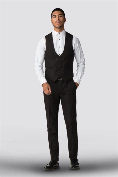 Waistcoats can act as another layer in your outfit. Shelby & Sons | Men's Black Waistcoat | Suit Direct