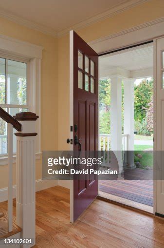 Open Front Door Of Home Interior Stock Photo Getty Images