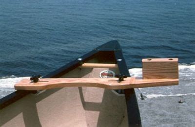 A canoe motor bracket, usually with a wooden block attached to it, can be mounted on the back of a canoe. How to Make Canoe Stabilizers | Ash Motor Mount for ...