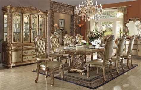 The table is constructed with a rectangular top with flame mahogany and banded inlay around perimeter, a beautifully carved apron. Vendome Gold Formal Dining Table Set | Gold dining room ...