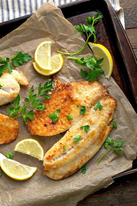 Squeeze on lime juice, then sprinkle with (optional) garlic powder and cilantro. 5-Ingredient Garlic Parmesan Tilapia - The Seasoned Mom