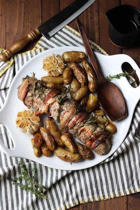 This roast pork loin and potatoes is a snap to prepare. One-Pan Herb Roasted Pork Loin, Potatoes, and Garlic