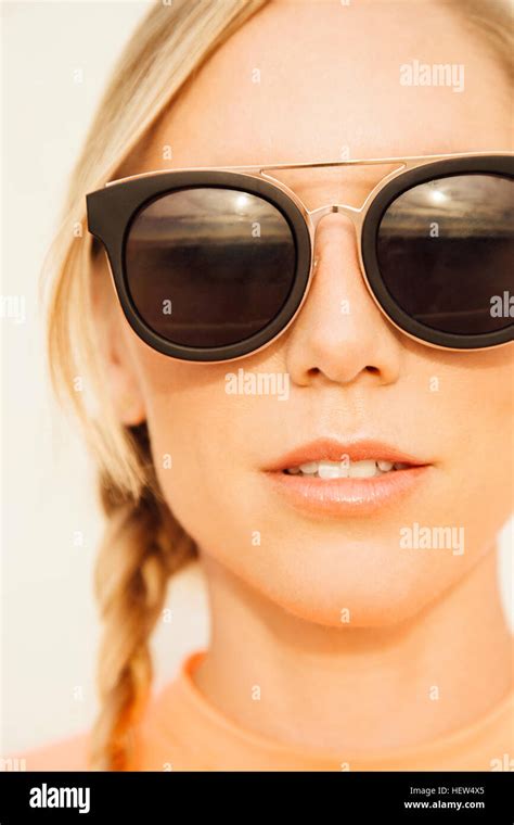 Close Up Portrait Of Woman Wearing Sunglasses Stock Photo Alamy