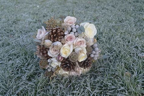 Winter Wedding Bouquet With Roses Brunia And Pine Cones Unusual