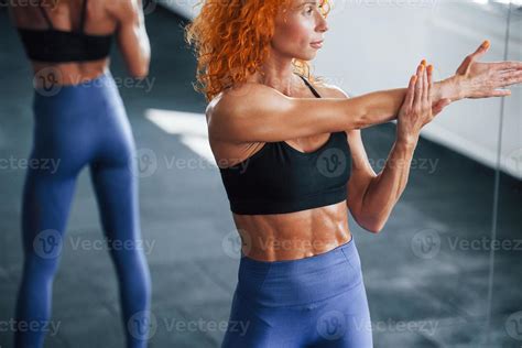 Warm Up Exercises Sporty Redhead Girl Have Fitness Day In Gym At