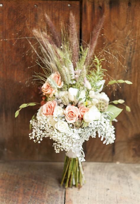 Creating warm, beautiful flower arrangements wrapped elegantly and delivered to a location of your choosing. Wood Acres Farm Connecticut Wedding - Rustic Wedding Chic