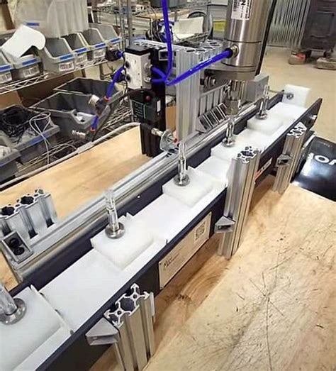 Tabletop Fillercapping System With Mini Mover Mini Mover Conveyors