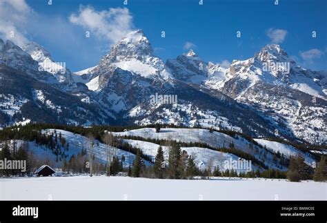 Grand Teton National Park Wy Snow Capped Fence Line With The Peaks Of