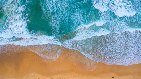 Beautiful Sea Waves And White Sand Beach In The Tropical Island Soft