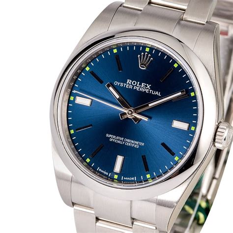Unworn 124300 oyster perpetual blue dial stainless steel watch. Rolex Oyster Perpetual 114300 Blue Index Dial