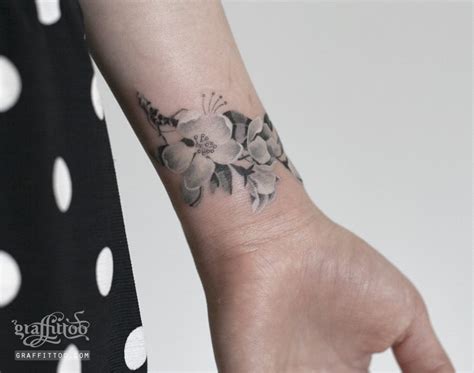 The flower is largely thought to symbolize rising above the temptations of life, and becoming a better person. River Tattooist, Graffittoo Tattoo Studio - The VandalList