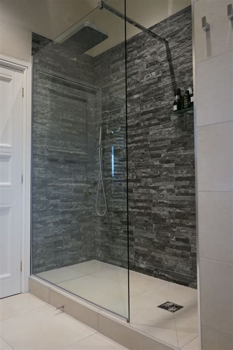 walk in shower with slate block tiles and raised wet room floor wet rooms ensuite shower room