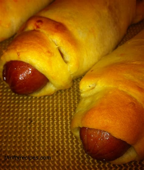 Cut the crescent roll dough into small strips that are slightly smaller than the lil' smokies. Easy Pigs in a Blanket Recipe (Using Crescent Rolls or ...