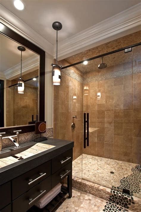 Tan And Black Pebble Tile Shower And Bathroom Flooring Brown Tile
