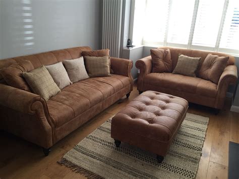 Tan Coloured Leather Sofas Grey Walls Living