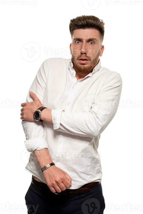 Studio Photo Of A Good Looking Man In A White Shirt Isolated Over A