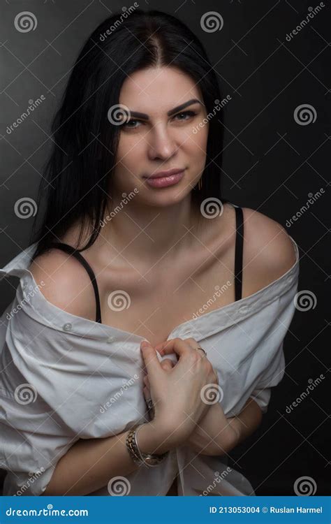 Studio Portrait Of A Brunette In White T Shirt Stock Photo Image Of Caucasian Looking