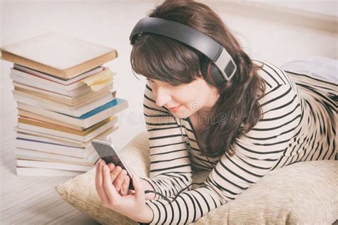 Woman Listening An Audiobook Stock Photo Image Of Hardcover