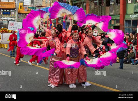 Performing The Traditional Chinese Fan Dance At The Chinese New Years