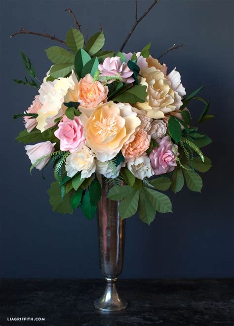 I used to make paper flowers all the time with my silhouette cameo like these extra large flowers for wall decor. Giant Paper Flower Bouquets for Cricut - Lia Griffith ...