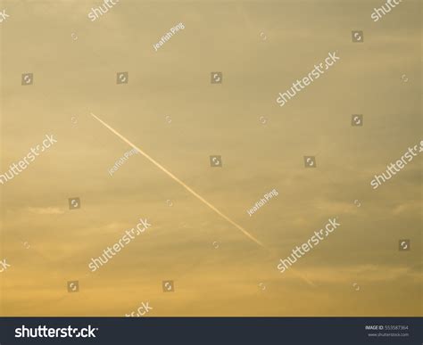 Aircraft Contrail Golden Twilight Sky Background Stock Photo 553587364