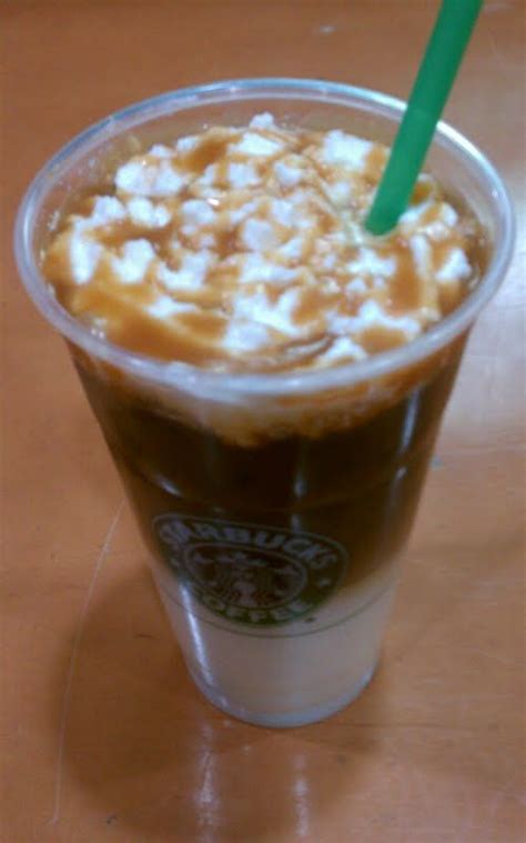 Caramel sauce is drizzled down the sides of cup before pouring the coffee and caramel is also drizzled on top of the foam. Starbucks Iced Caramel Cloud Macchiato - change comin