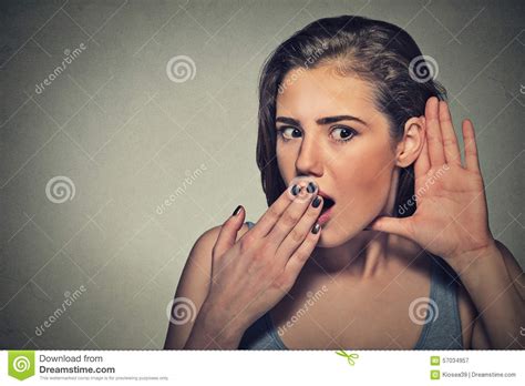 Surprised Nosy Woman With Hand To Ear Gesture Listening Stock Image