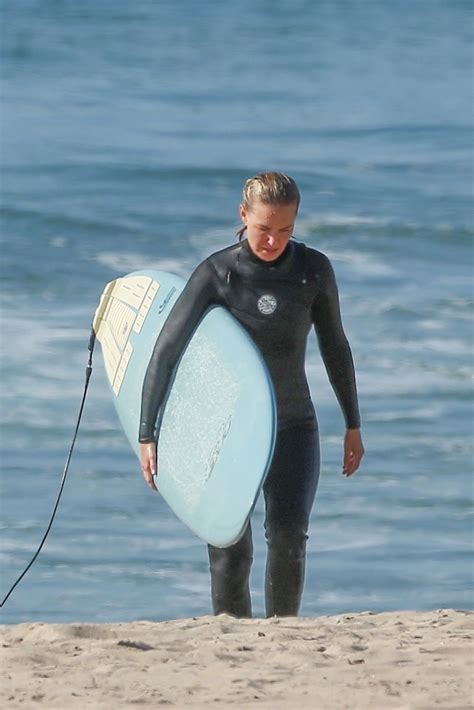 Lara Bingle In Wetsuit Surfing In Malibu Hawtcelebs
