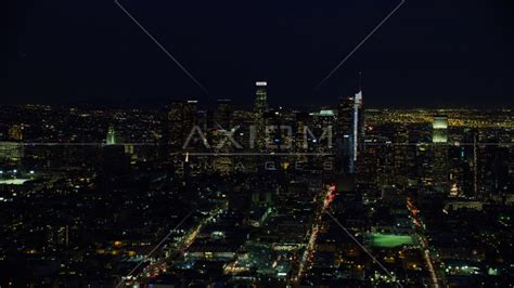 Towering Skyscrapers Of The Citys Skyline At Night In Downtown Los