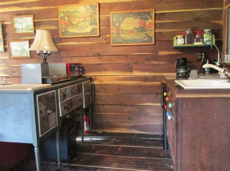 All hardwood from dining table top to table legs. The kitchenette includes a small refrigerator, hot plate ...