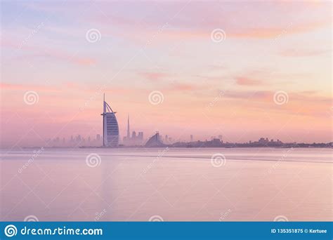 Dubai Skyline Lighted With Beautiful Sunrise Colors Stock Image Image