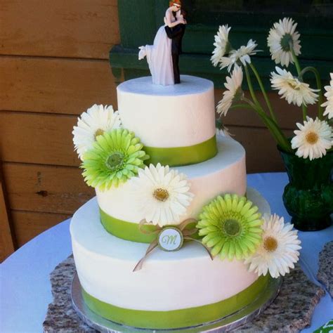 The square are angled at 45 degree's and decorated with handmade gum paste bamboo and green cymbodium. White and sage green wedding cake I made for the beautiful Mrs. Musser :) | Green wedding cake ...