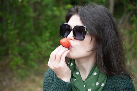 Young Beautiful Brunette Woman Eat Strawberry Dessert At Picnic On The Bench Stock Image Image